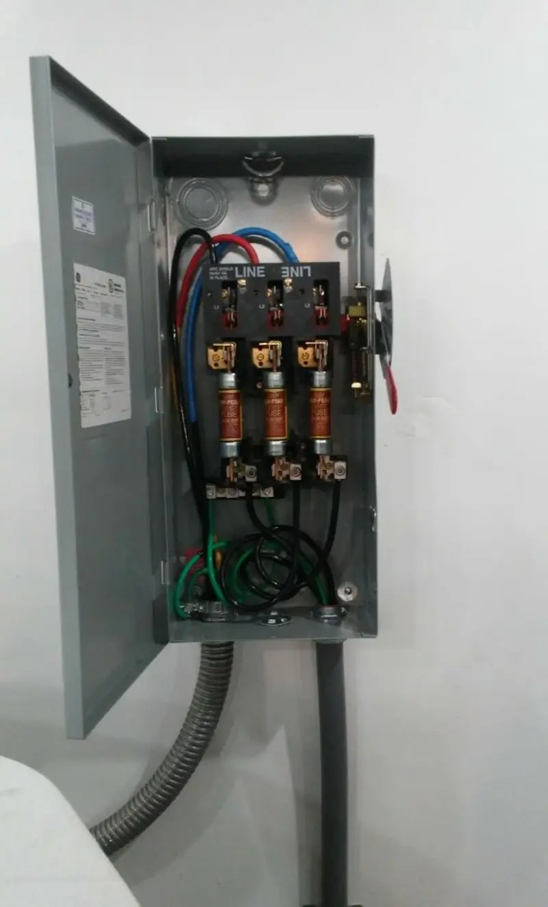 Three-phase disconnect switch installed for Smoke Detector Installation in Tecumseh